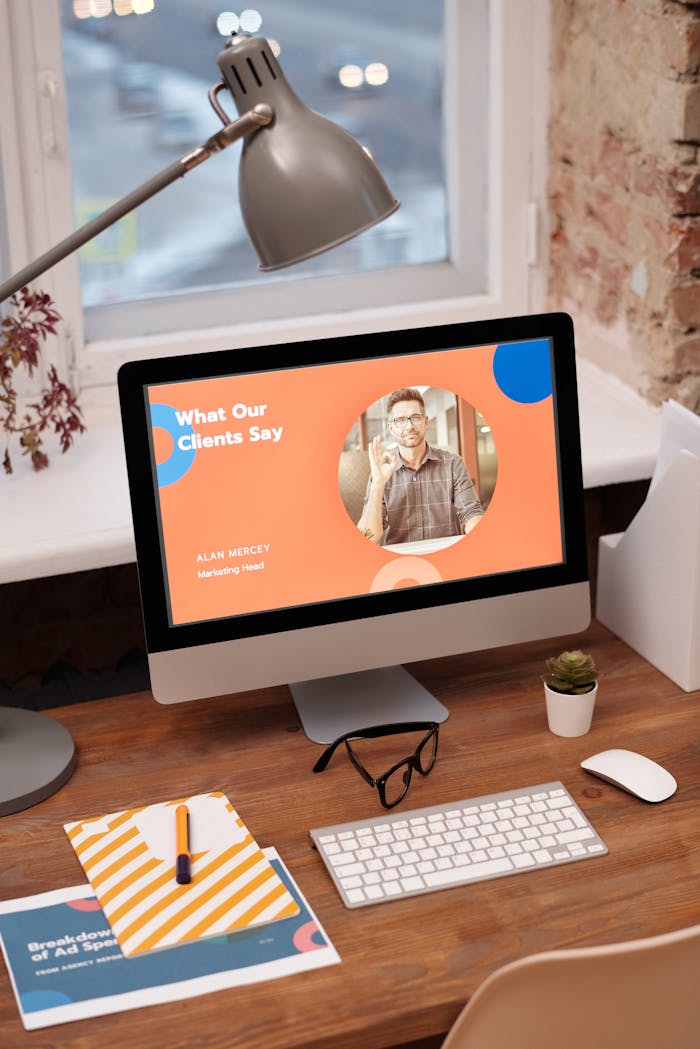 gallery-1 Stylish home office setup with computer showcasing client testimonials.